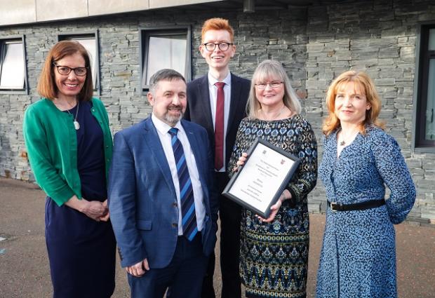1.	Photo caption: From left: Dr Gwyneth Brow, Church View Family Practice; Health Minister Robin Swann; Dr Marcus Graham; Dr Grainne Doran, and Dr Nicky Doyle, Church View Family Practice