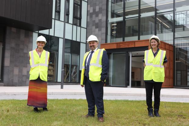 Pictured outside the new Maternity hospital with Health Minister Robin Swann are Dr Cathy Jack, Chief Executive, Belfast Health and Social Care Trust and Brenda Kelly, Head of Midwifery, Belfast Health and Social Care Trust