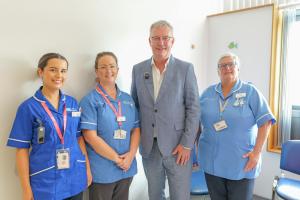 South Eastern Trust paediatric pre-assessment nursing team Sophie Ardis, Katrina Shaw and Lindy Ketley with Health Minister Mike Nesbitt.