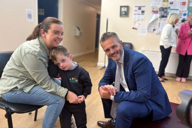 Photo of Minister with Anita and Oisin (3) Faux from Roslea