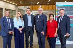 Photo of Health Minister with staff during Omagh Hospital visit  