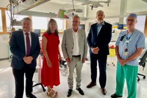 Professor Mark Taylor; Roisin Coulter, Chief Executive South Eastern Trust; Health Minister Mike Nesbitt; Finance Minister John O'Dowd and Downe Hospital theatre manager Paul Reilly at Downe Hospital Day Procedure Unit